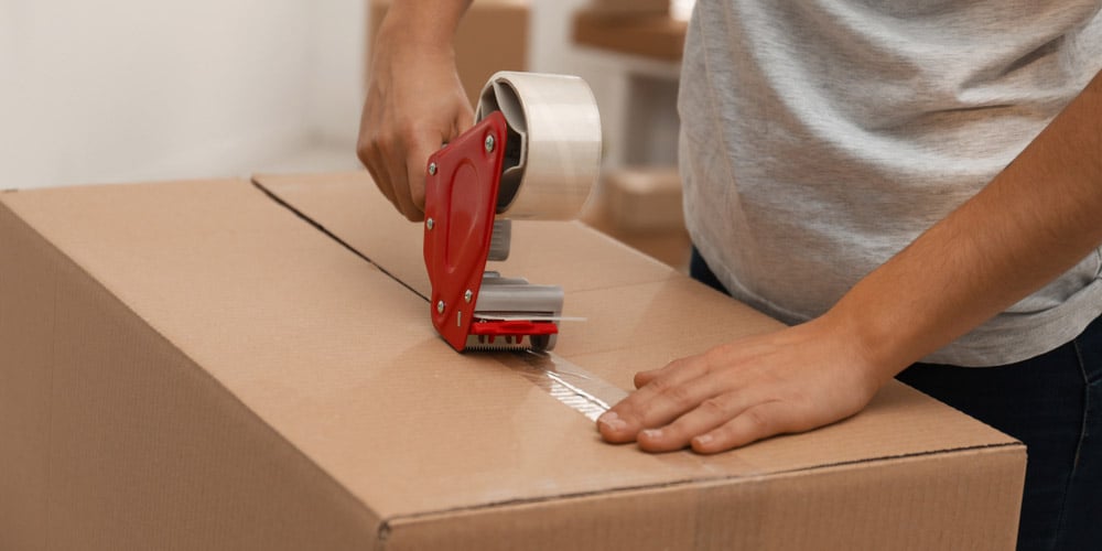 Retailer packing a parcel