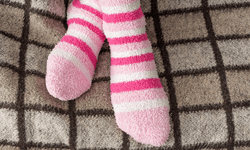 fluffy socks on feet