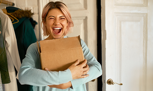 Happy person with parcel