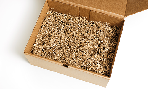 Shredded cardboard product packaging